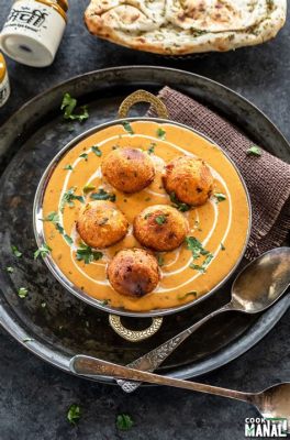  Malai Kofta: ¡Una Sinfonía de Texturas Cremosas y Sabores Especiados!